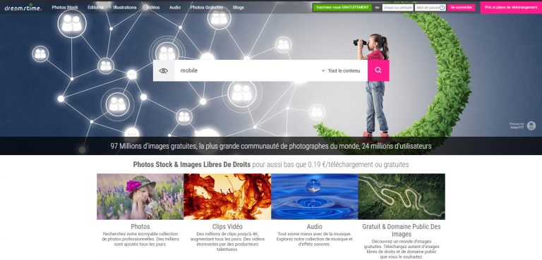 Page d’accueil de Dreamstime en 2019, avec une fillette aux jumelles et des catégories d’images